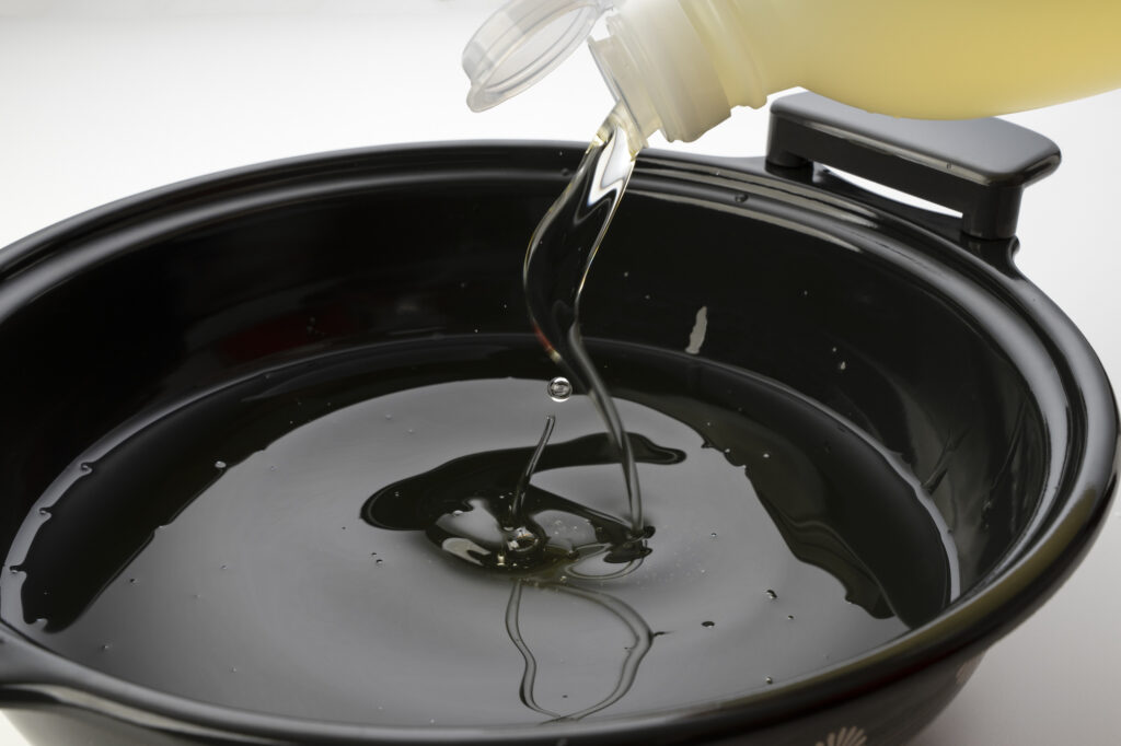 注ぎ足される油